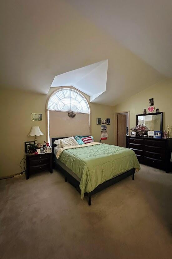 1518 West 96th Place Crown Point, IN 46307 - Photo 22 of 37 a bedroom with a bed and a chandelier