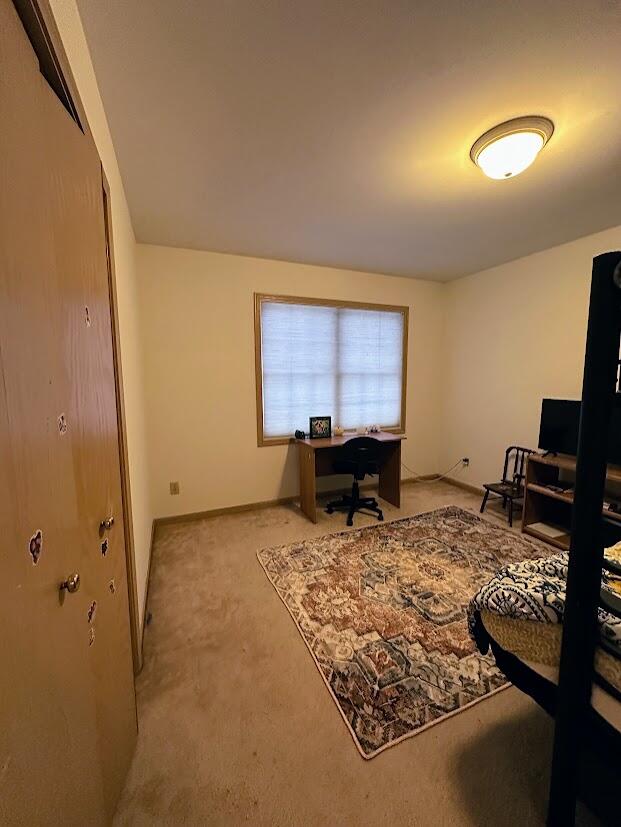 1518 West 96th Place Crown Point, IN 46307 - Photo 27 of 37 a view of a livingroom with workspace and a window