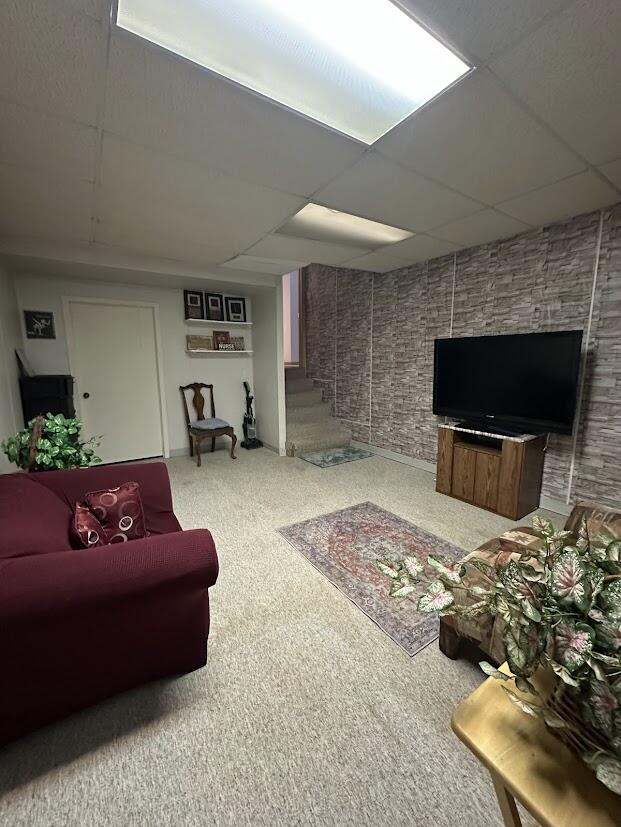 1518 West 96th Place Crown Point, IN 46307 - Photo 37 of 37 a living room with furniture and a flat screen tv