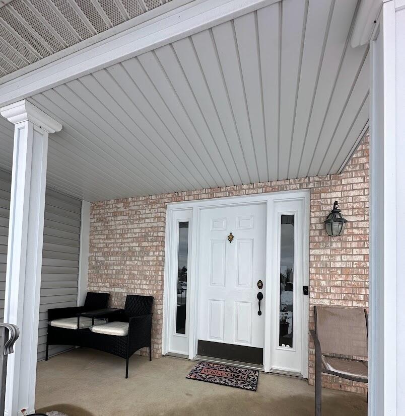1518 West 96th Place Crown Point, IN 46307 - Photo 4 of 37 a view of a livingroom with furniture and a barbeque