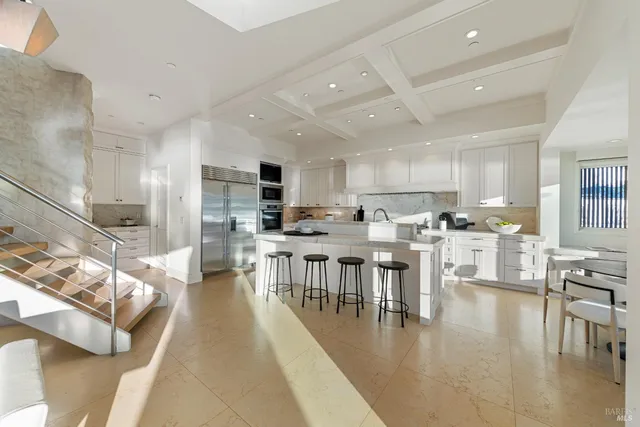 a view of a terrace with furniture and a table