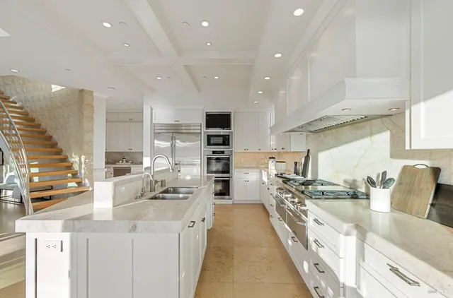 a bathroom with a double vanity sink a mirror and shower
