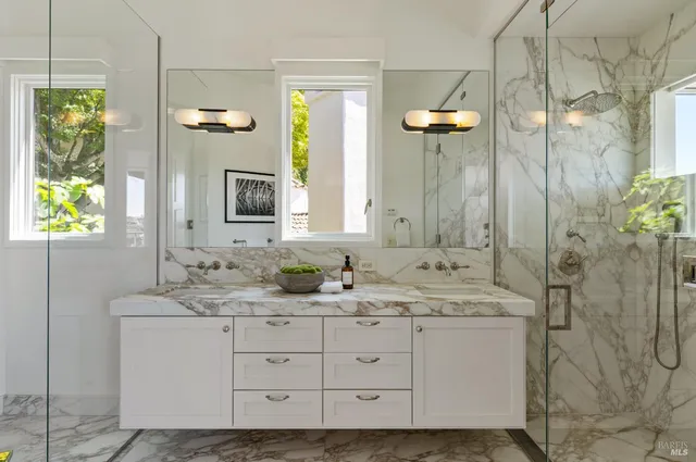 a view of multiple house with outdoor space and lake view