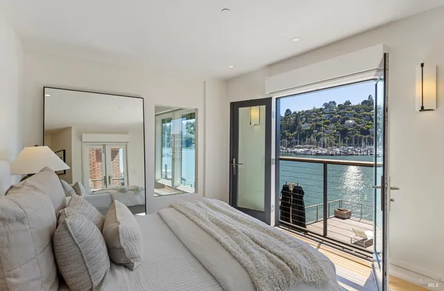 a view of a balcony with chairs