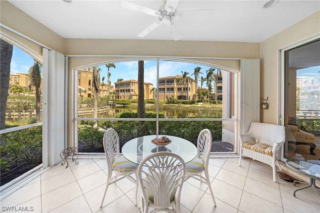 3228 Sunset Key Circle, Unit 101 Punta Gorda, FL 33955 - Photo 5 of 33 a living room with furniture and a large window