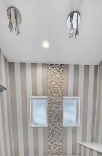 an aerial view of residential houses with outdoor space and street view