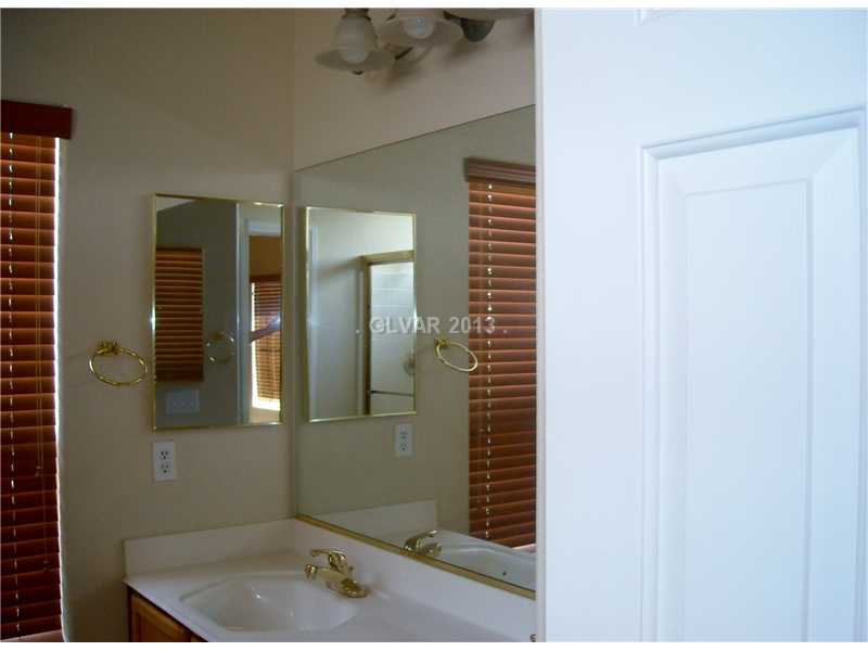 275 Reflection Ridge Court Henderson, NV 89052 - Photo 11 of 18 Property Photo. master bath w/shower and double sinks