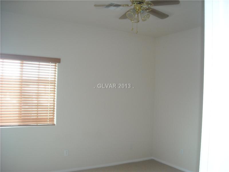 275 Reflection Ridge Court Henderson, NV 89052 - Photo 15 of 18 Property Photo. 3rd bedroom w/ceiling fan