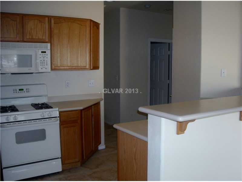 Property Photo. Kitchen w/pantry