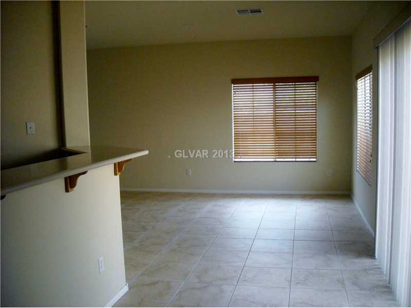 Property Photo. Nice size breakfast bar corian counter tops