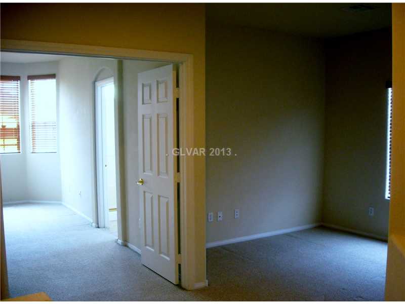 275 Reflection Ridge Court Henderson, NV 89052 - Photo 9 of 18 Property Photo. looking into master bedroom w/double doors