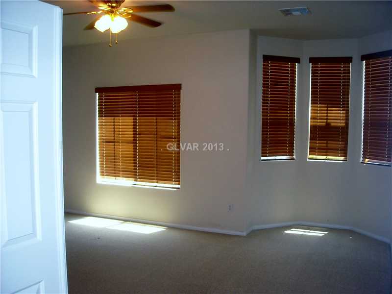 275 Reflection Ridge Court Henderson, NV 89052 - Photo 10 of 18 Property Photo. master bedroom w/sitting area