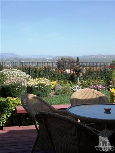 11699 Chestnut Ridge Street Moorpark, CA 93021 - Photo 19 of 20 a view of a swimming pool and outdoor seating