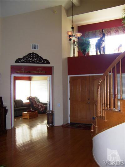 11699 Chestnut Ridge Street Moorpark, CA 93021 - Photo 4 of 20 a view of empty room with wooden floor