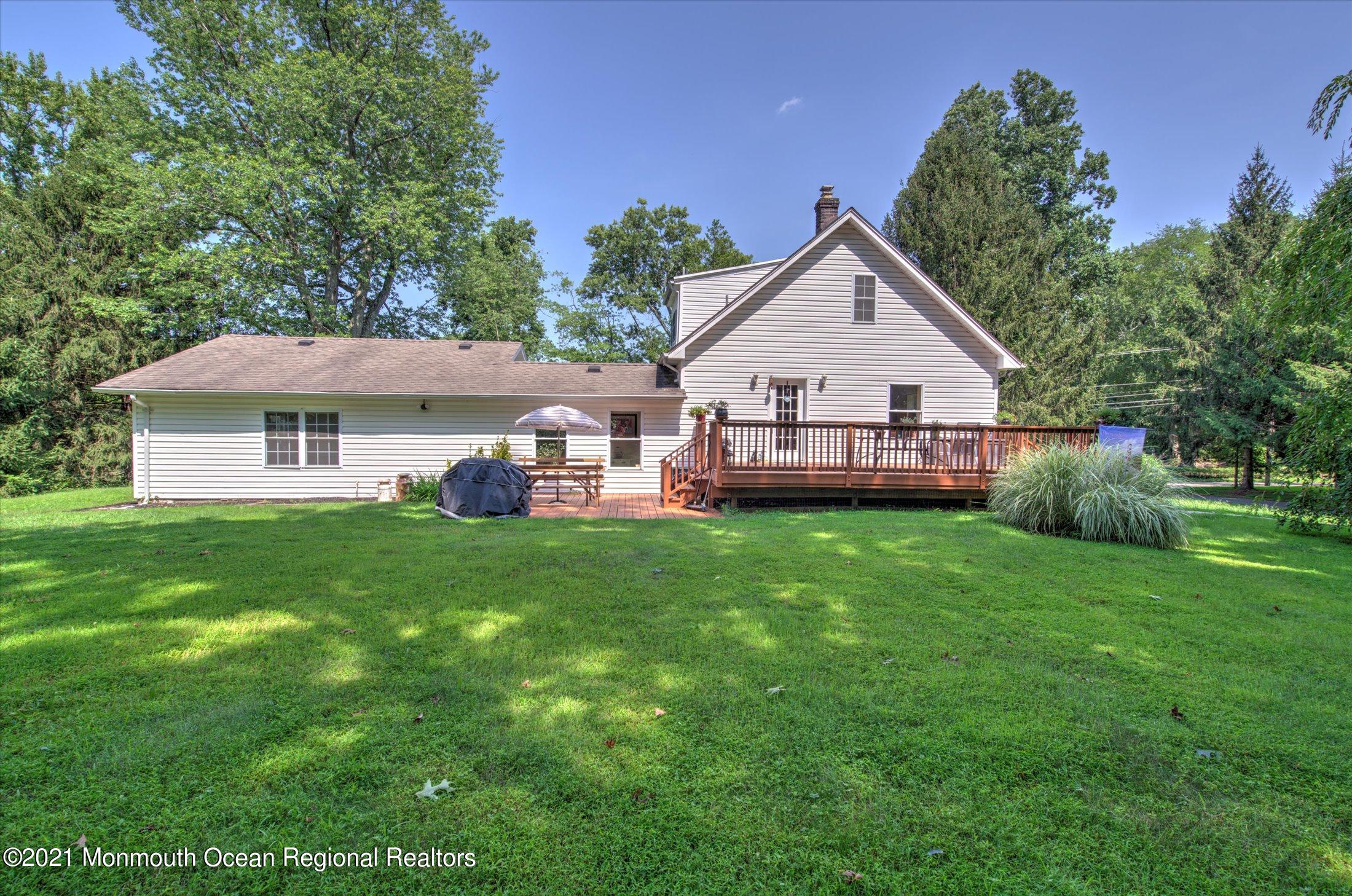 87 Millhurst Road Manalapan, NJ 07726 - Photo 3 of 44 34-BACK