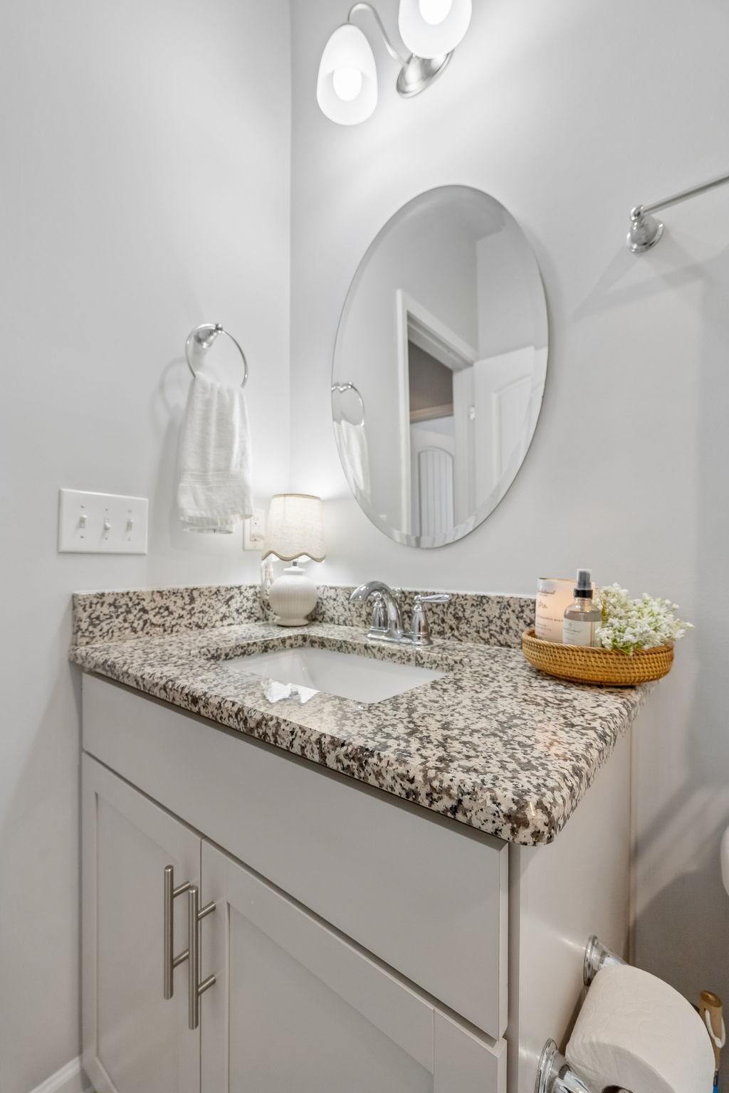 320 Manor Row Pleasant View, TN 37146 - Photo 12 of 39 a bathroom with a granite countertop sink and a mirror