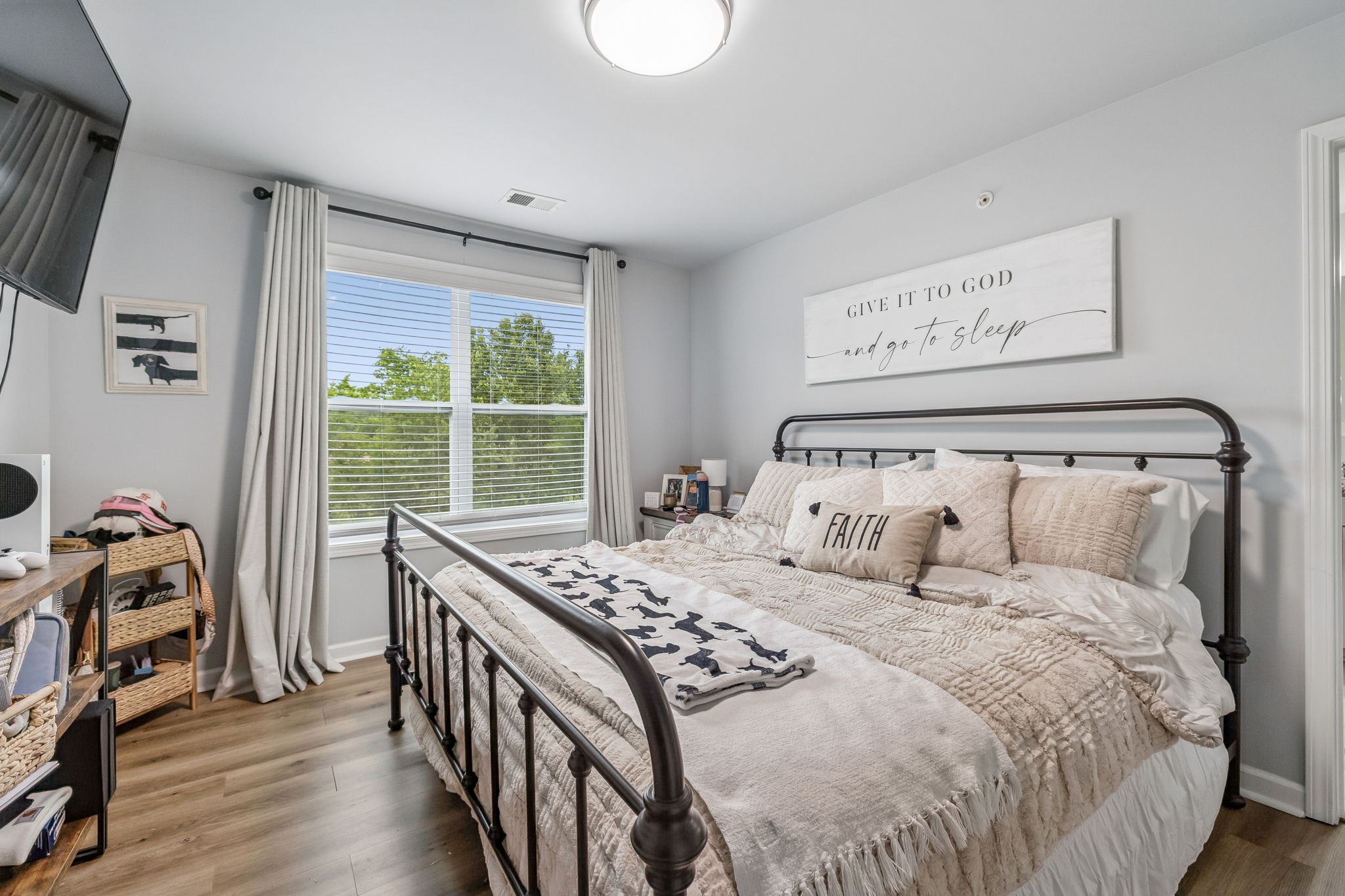 320 Manor Row Pleasant View, TN 37146 - Photo 24 of 39 a bedroom with a bed and a window