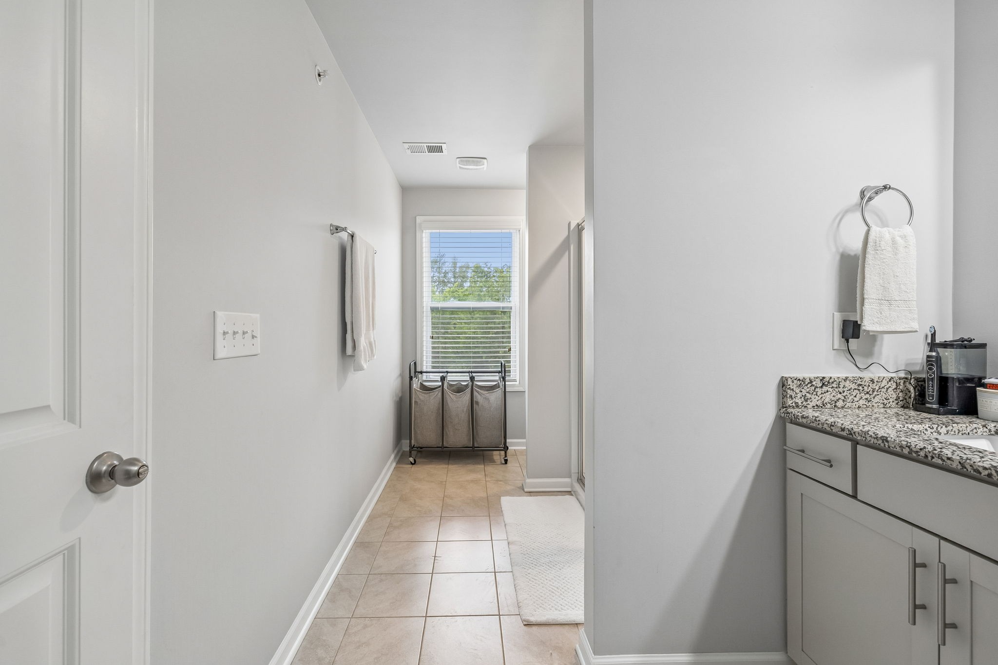 320 Manor Row Pleasant View, TN 37146 - Photo 26 of 39 a bathroom with a sink a toilet and shower