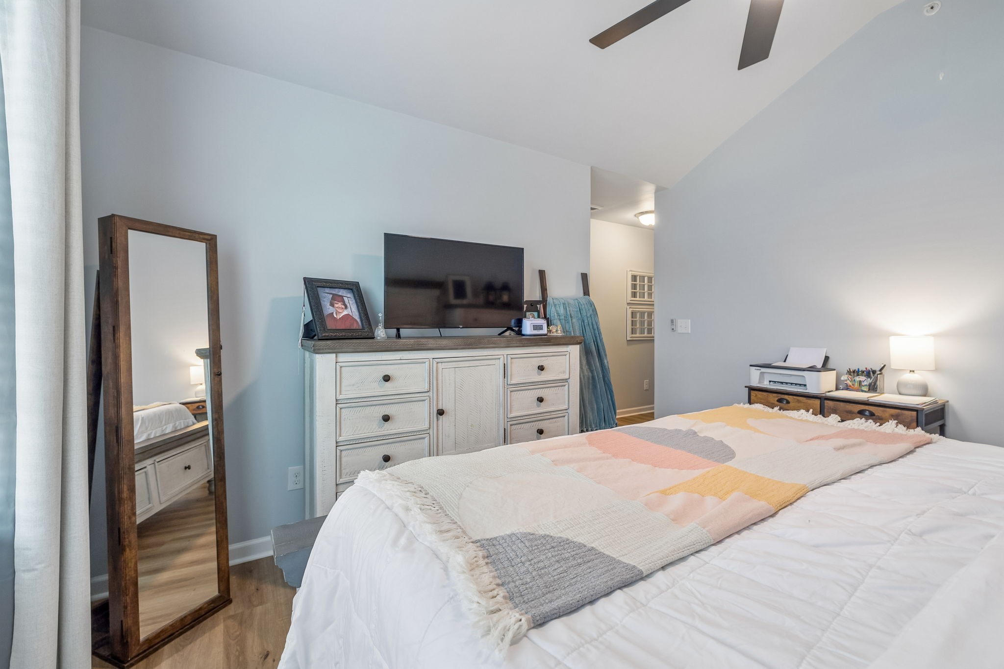 320 Manor Row Pleasant View, TN 37146 - Photo 36 of 39 a bedroom with a bed and a flat screen tv
