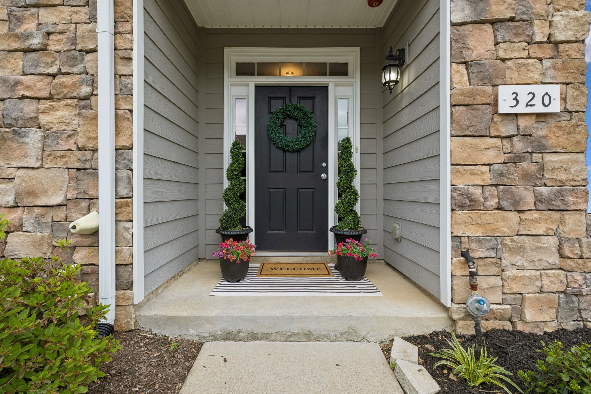 320 Manor Row Pleasant View, TN 37146 - Photo 7 of 39 a view of door with wooden door