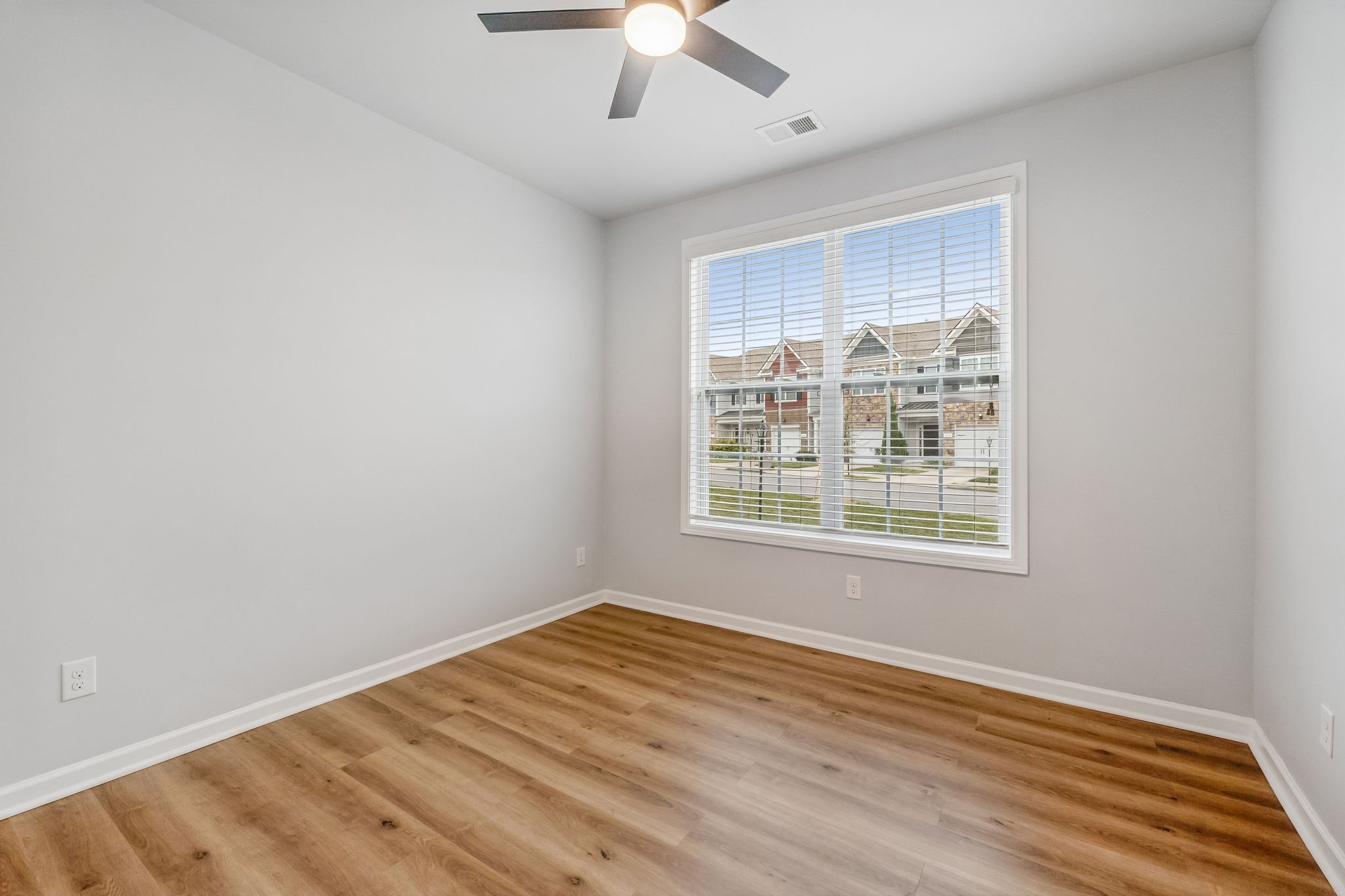 320 Manor Row Pleasant View, TN 37146 - Photo 9 of 39 an empty room with a window