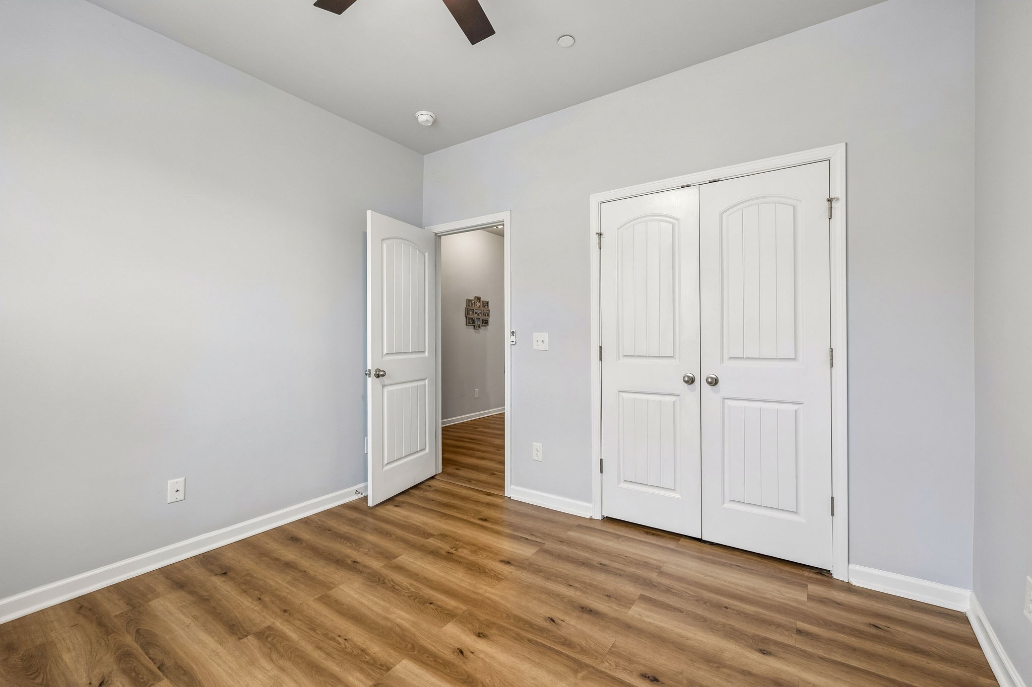 320 Manor Row Pleasant View, TN 37146 - Photo 10 of 39 a view of a livingroom with wooden floor and closet
