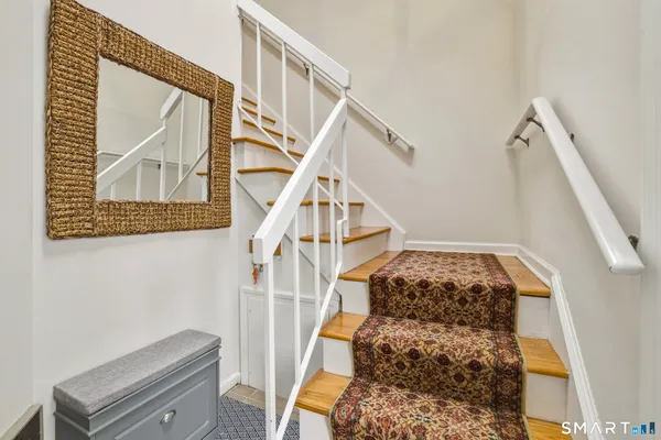a view of entryway with a front door