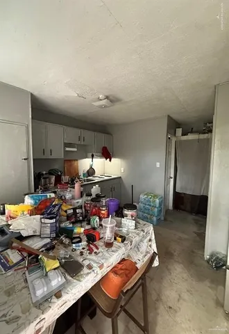 a view of a workspace with furniture