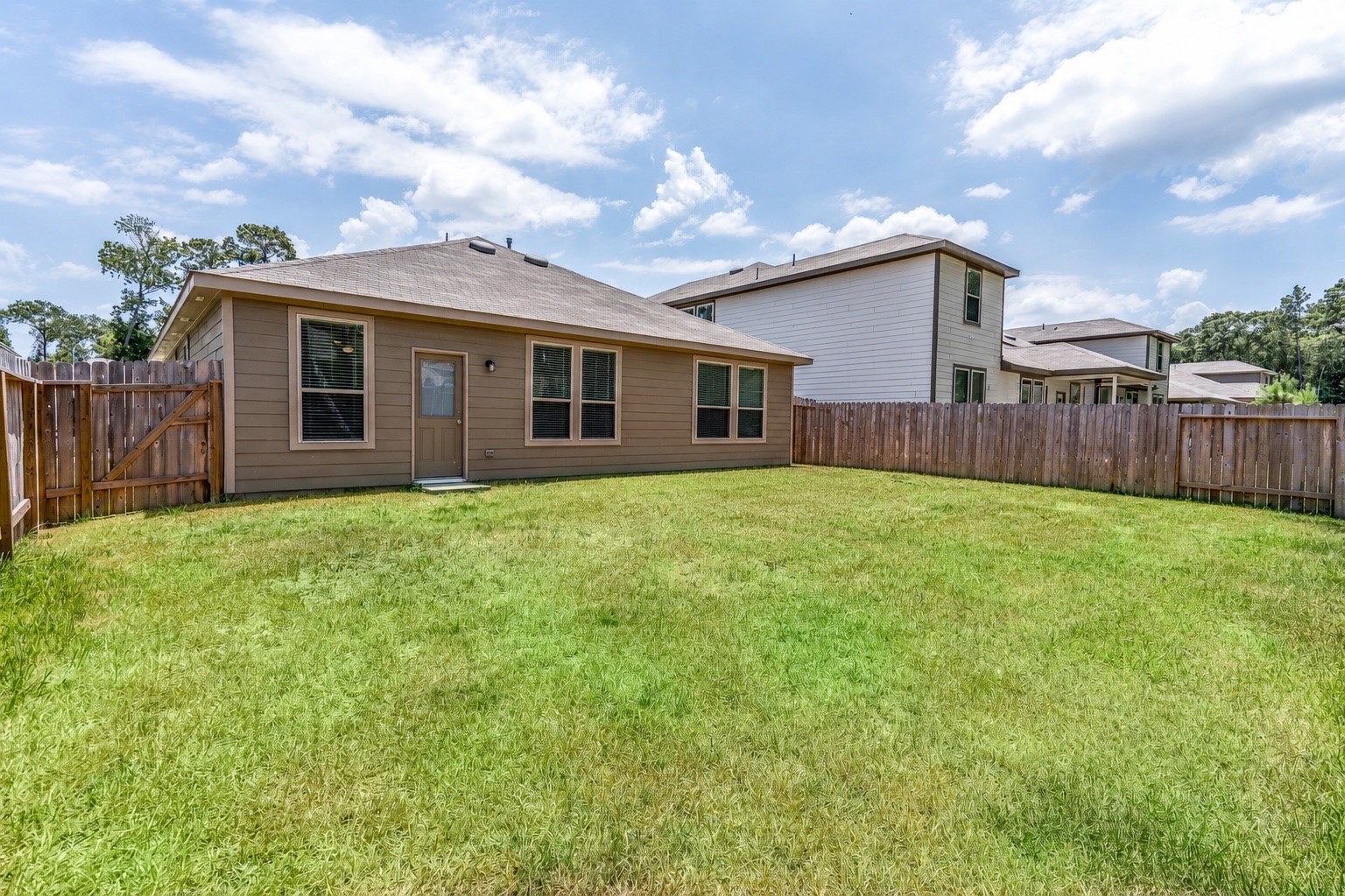 4256 Pine Still Road Conroe, TX 77304 - Photo 21 of 21 Immense backyard great for entertaining or relaxing