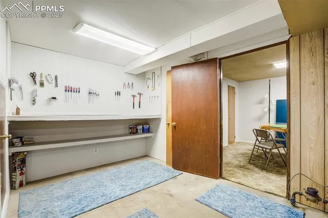 a storage room with washer and dryer