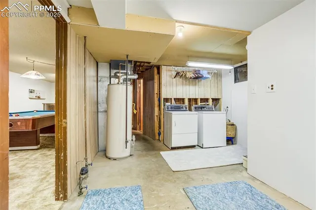a dining room with a wooden table and chairs