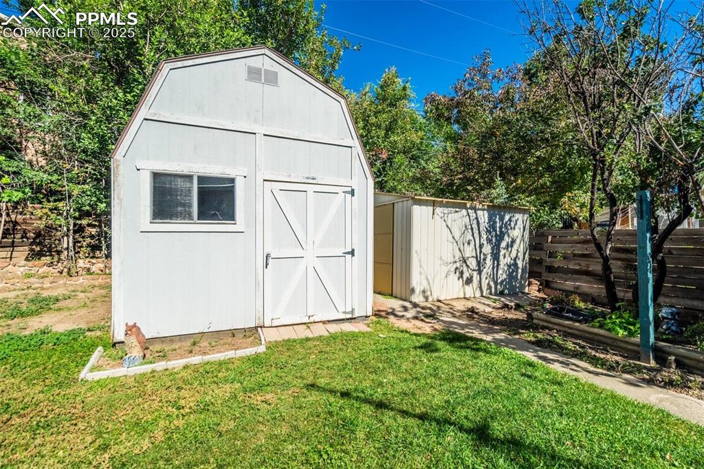 1343 Oswego Street Colorado Springs, CO 80904 - Photo 42 of 47 a view of backyard with a garden and plants