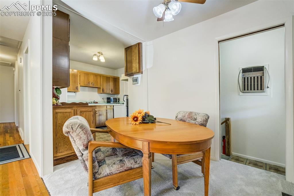 1343 Oswego Street Colorado Springs, CO 80904 - Photo 8 of 47 a dining room with furniture and window