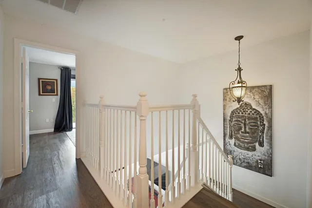 a view of entryway with wooden floor