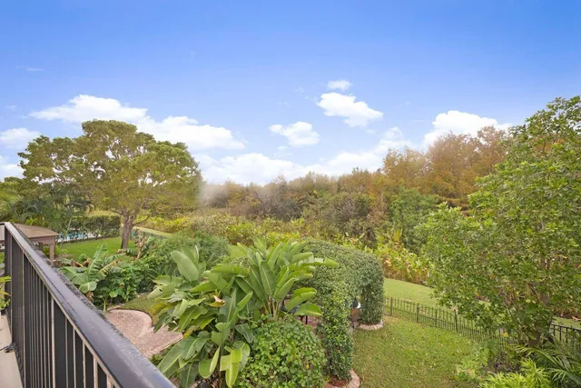 a view of a lake from a balcony