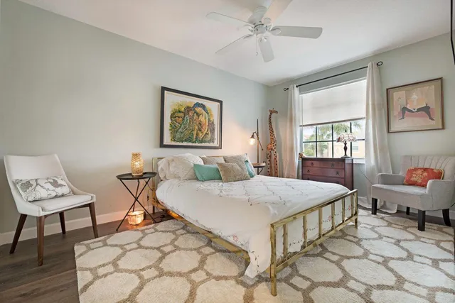 a living room with a bed and furniture