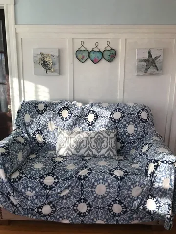 a vase of flowers sitting on a table