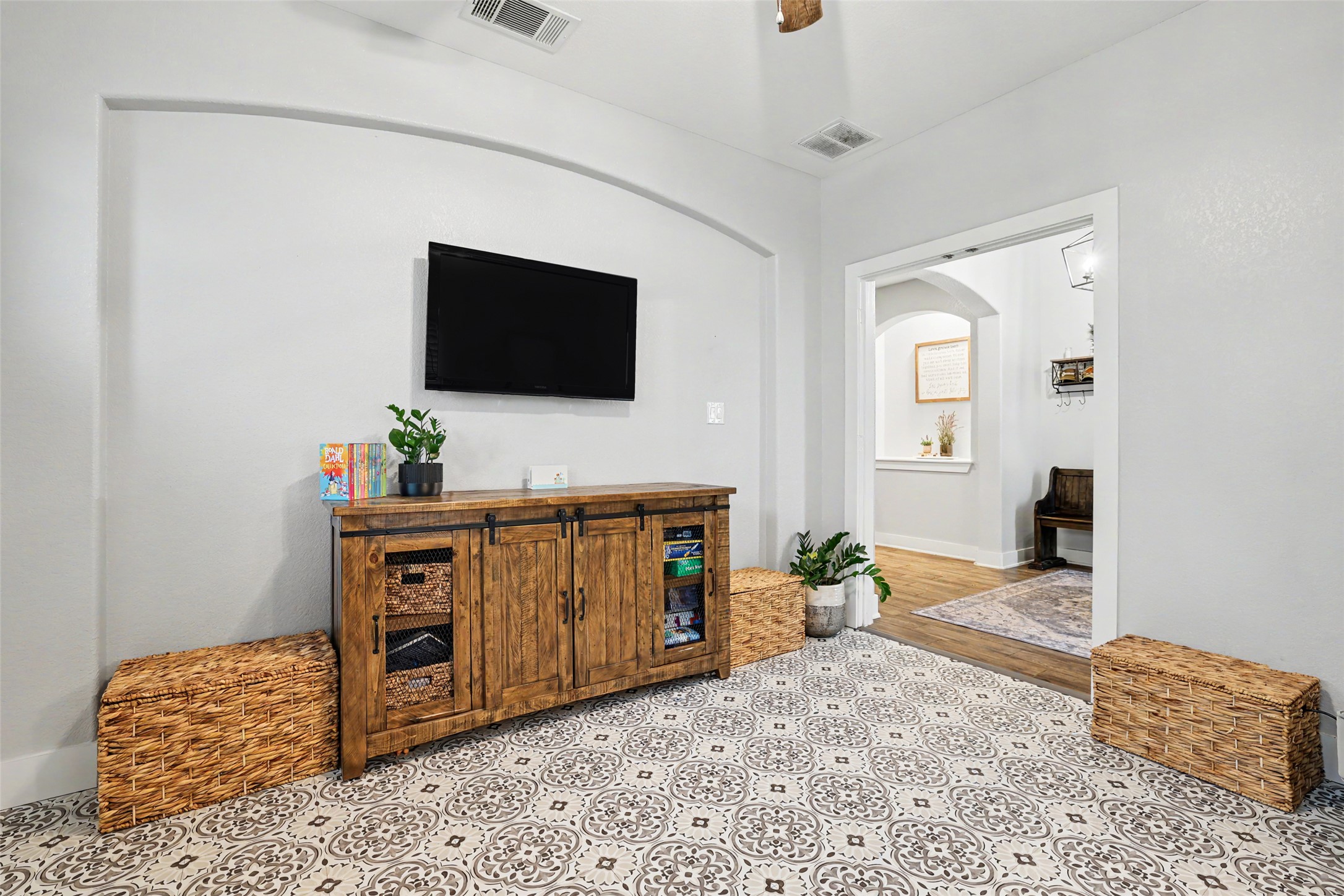 117 Rock Dock Road Georgetown, TX 78633 - Photo 8 of 38 a living room with furniture and a flat screen tv
