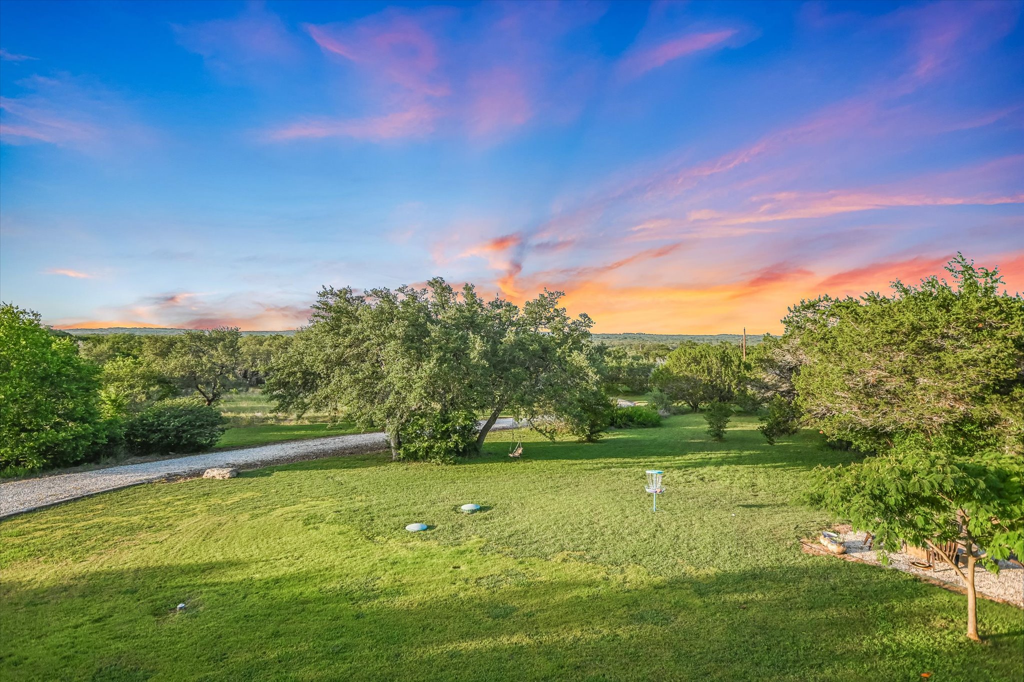 250 Hidden Oaks Road Wimberley, TX 78676 - Photo 3 of 40 a view of an outdoor space