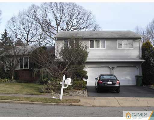 22 Library Place Edison, NJ 08820 - Photo 1 of 1 a car parked in front of a house