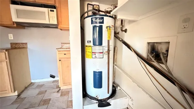 a view of living room with furniture and entryway