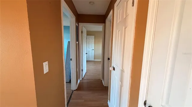 a view of a bathroom from a hallway