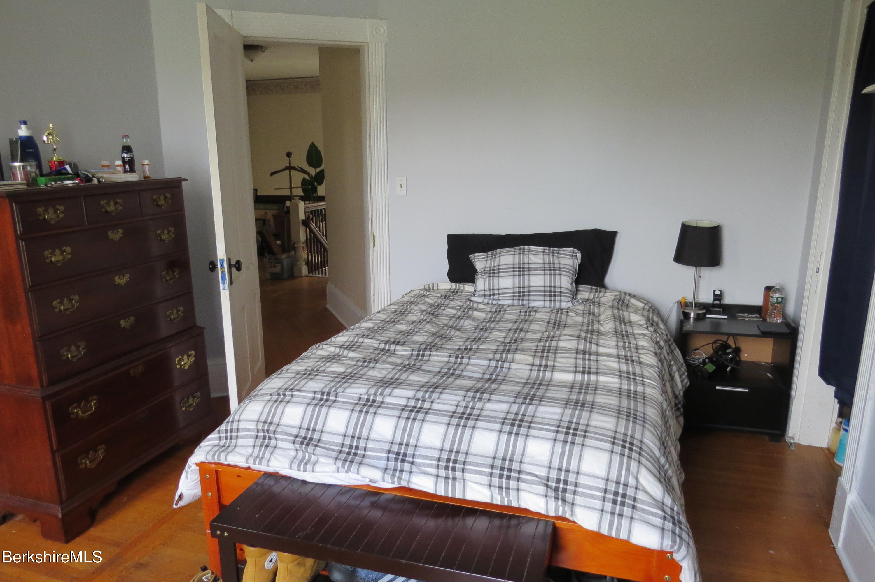 29 Crandall Street Adams, MA 01220 - Photo 40 of 61 a bedroom with a bed and wooden floor