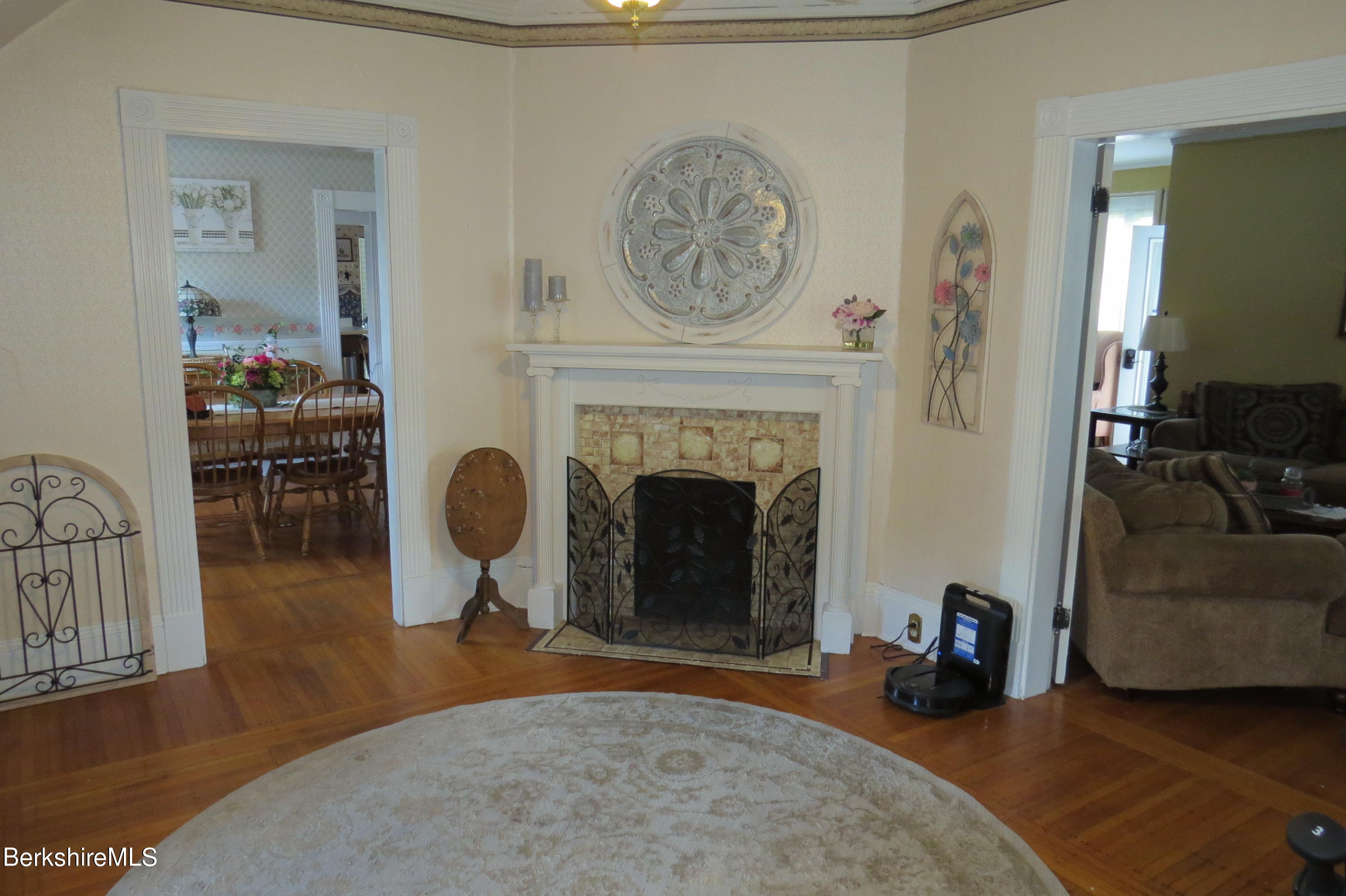 29 Crandall Street Adams, MA 01220 - Photo 5 of 61 a living room with furniture and a fireplace