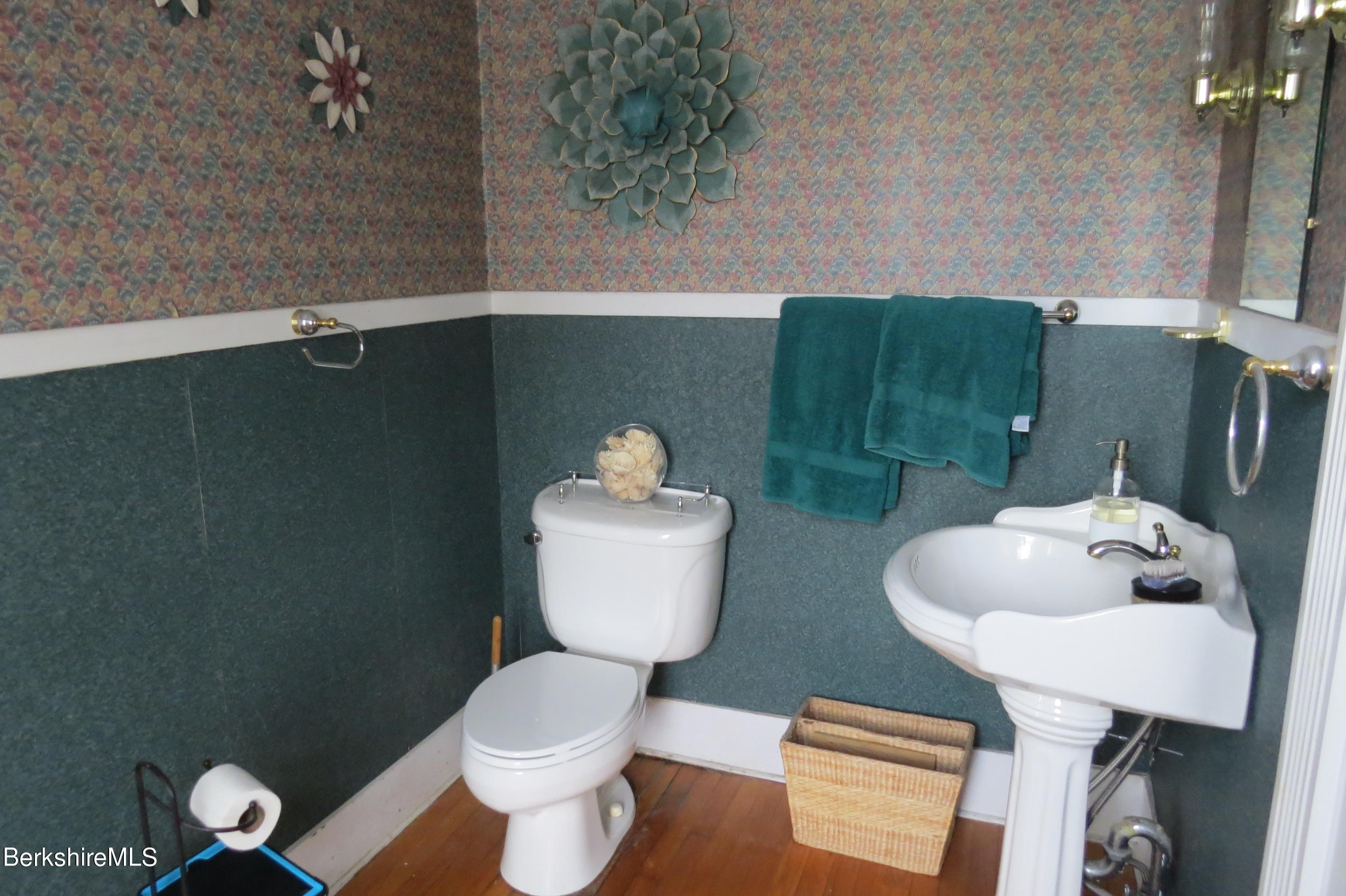 29 Crandall Street Adams, MA 01220 - Photo 42 of 61 a bathroom with a toilet sink and mirror