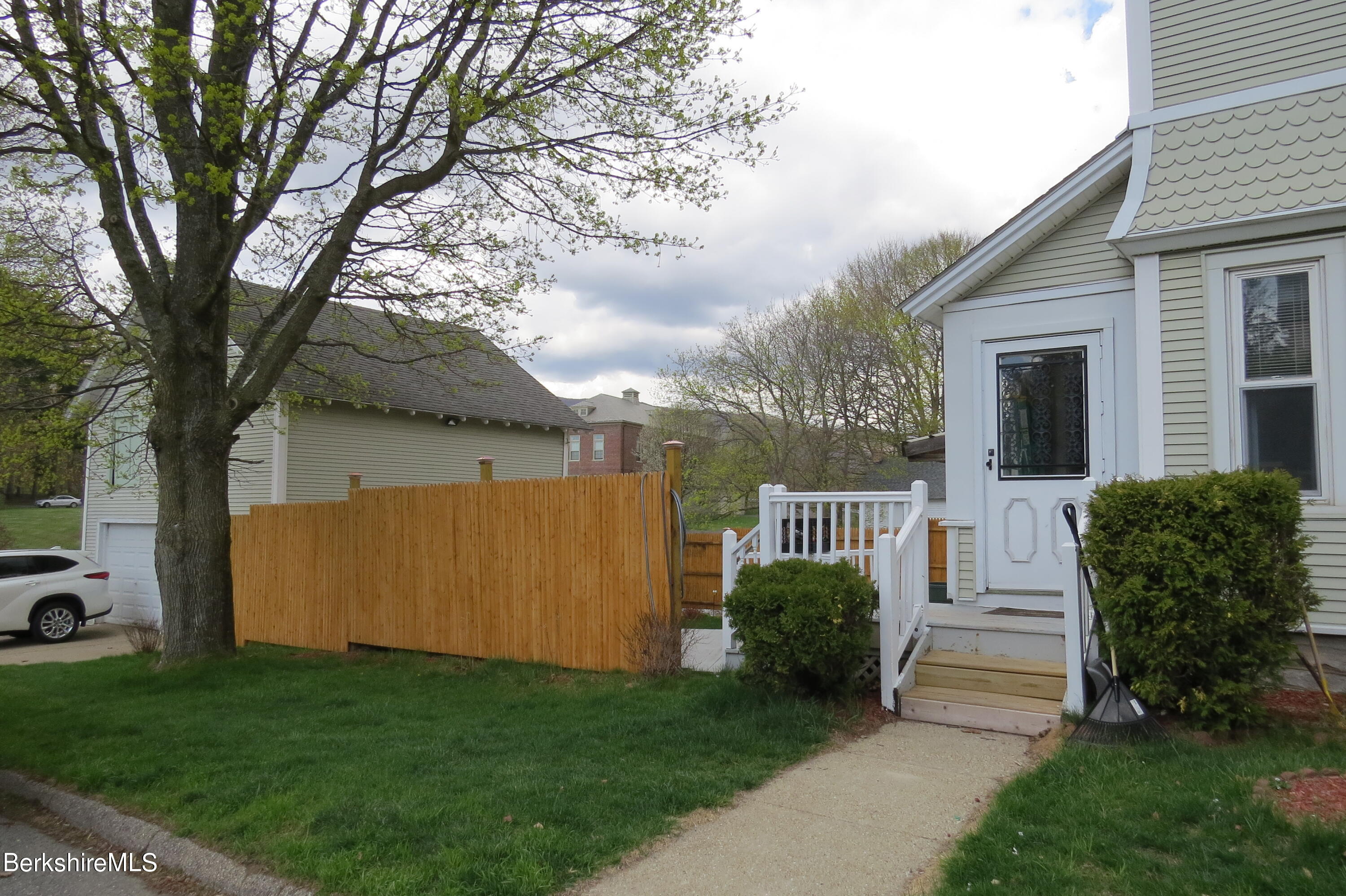 29 Crandall Street Adams, MA 01220 - Photo 45 of 61 a view of a house with backyard and a tree