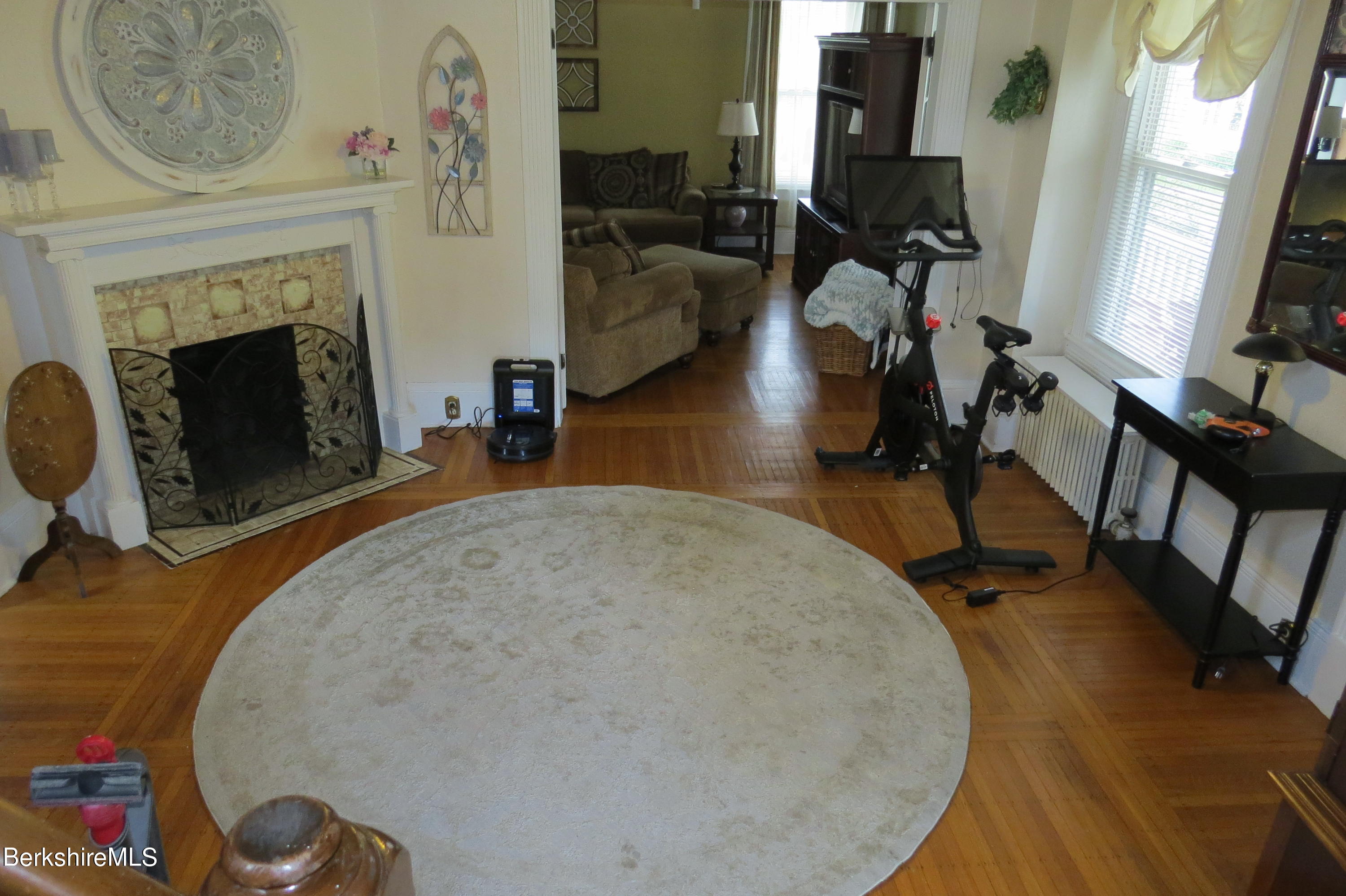 29 Crandall Street Adams, MA 01220 - Photo 6 of 61 a view of a livingroom with furniture and a fireplace