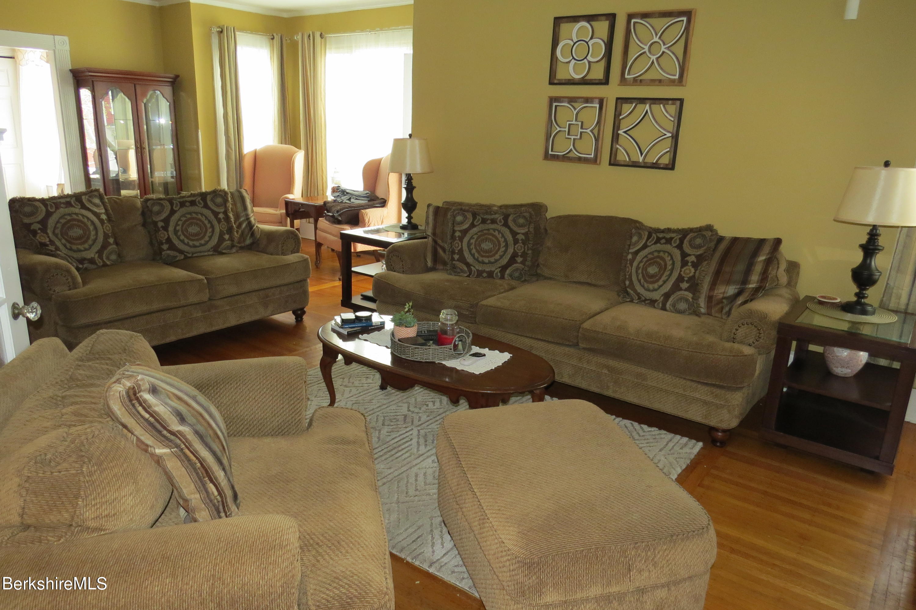 29 Crandall Street Adams, MA 01220 - Photo 9 of 61 a living room with furniture or couch and a large window