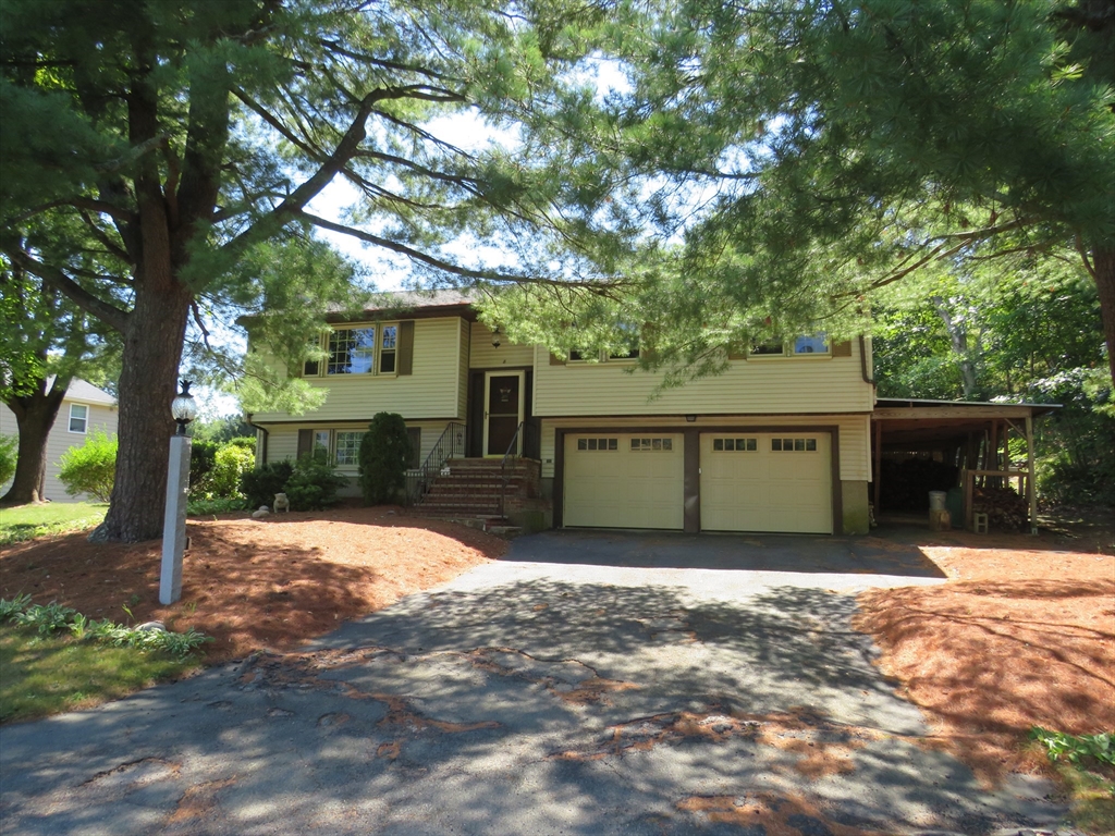 8 Talbot Road Canton, MA 02021 - Photo 2 of 41 a front view of house with yard and trees