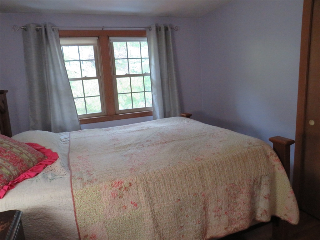8 Talbot Road Canton, MA 02021 - Photo 23 of 41 a bedroom with a bed and a window